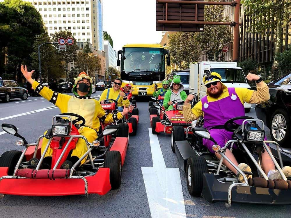 Driving mario kart on the open streets of Tokyo.