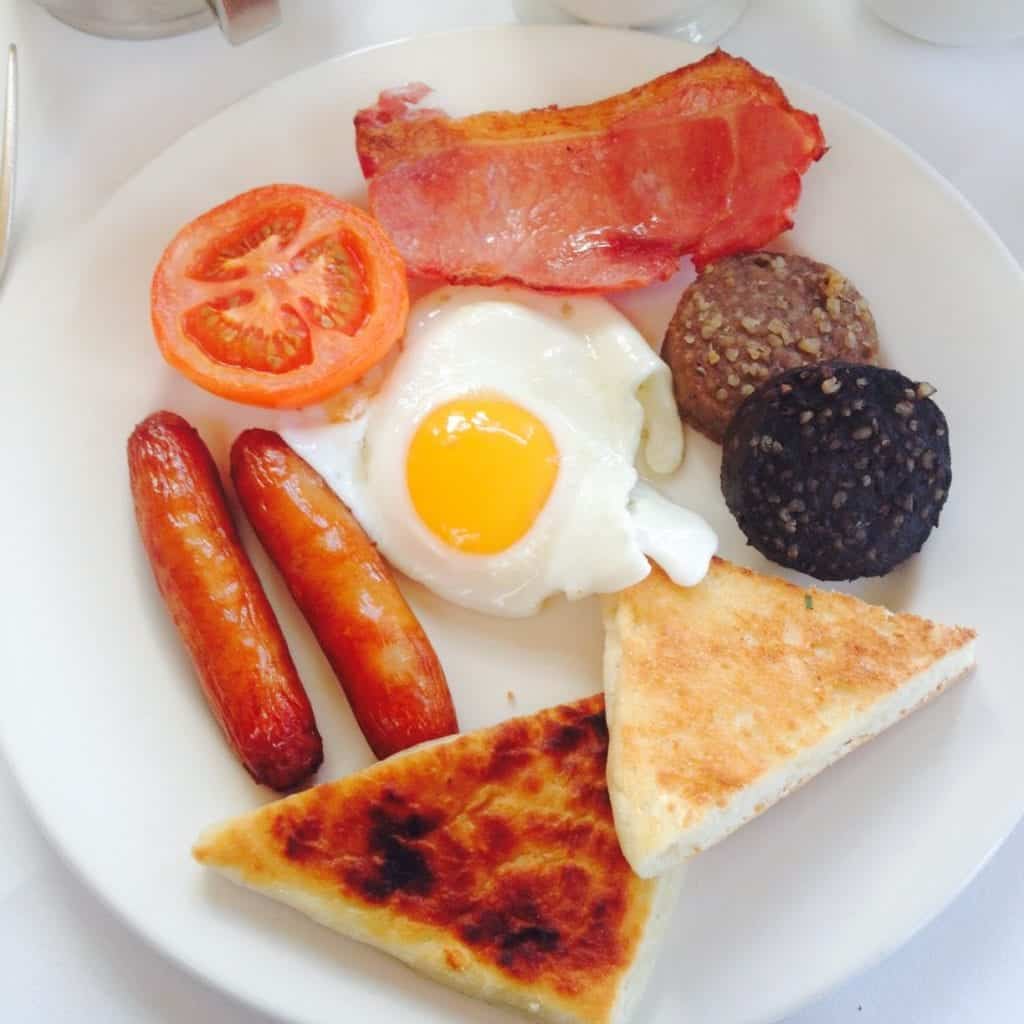 Serving a plate of Ulster Fry in nordirland.
