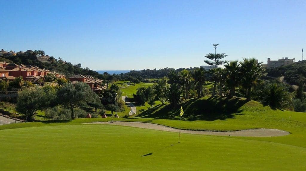 Golfing over the slopes of Santa Clara Golf Marbella in spain.
