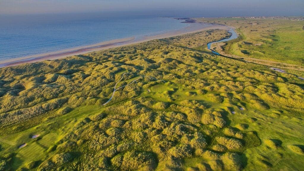 Droneshot over Fraserburgh Golf Club Corbie Hill and the ocean in Skottland,
